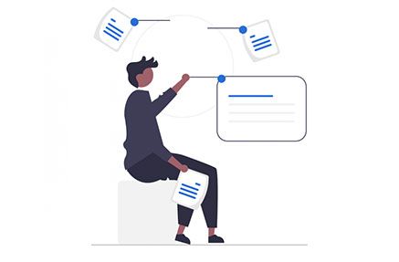 Person sitting and analyzing documents