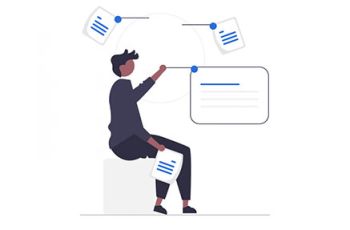 Person sitting and analyzing documents