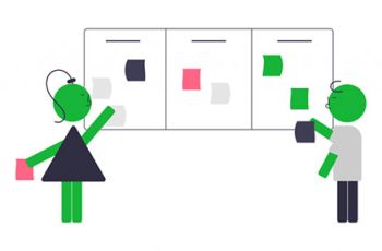 Two people placing notes on a collaborative board