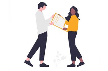 Man and woman holding a document
